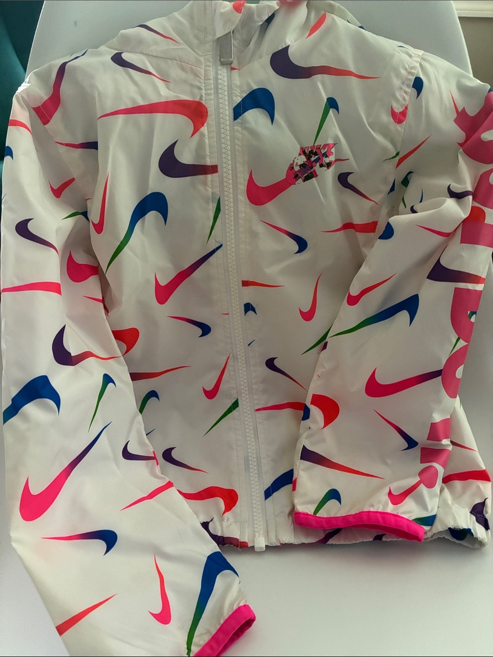 Nike Kids White Rain Jacket with Multicolor Swoosh Print